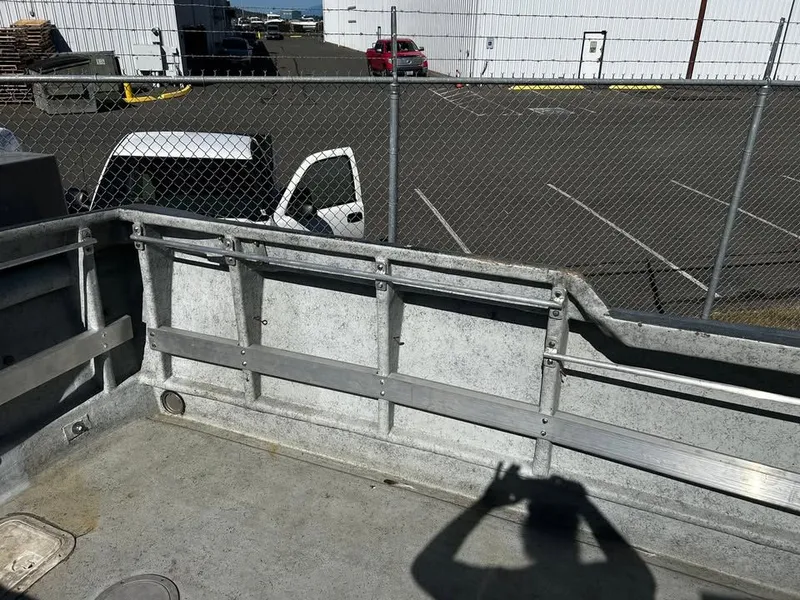 Slide: The Image of Uniflite Custom Crab/Dive Boat 2020, empty deck, parked at harbor. - 5