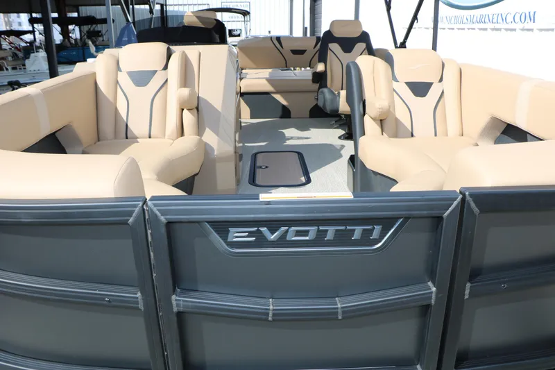 Slide: The Image of 2026 Evotti 723CS pontoon boat with beige seating and modern design. - 26