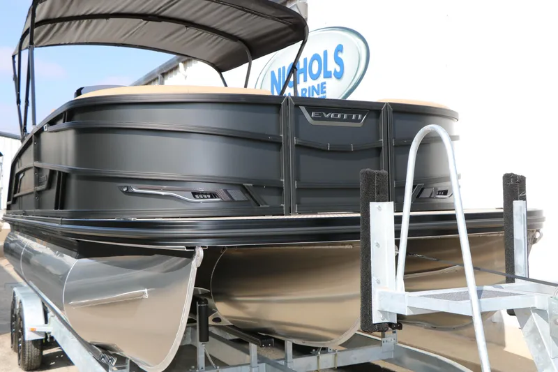 Slide: The Image of 2026 Evotti 723CS pontoon boat on trailer, displayed at Nichols Marine. - 4