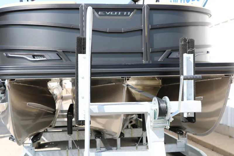 Slide: The Image of 2026 Evotti 723CS pontoon boat on trailer, showcasing sleek design and modern features. - 5