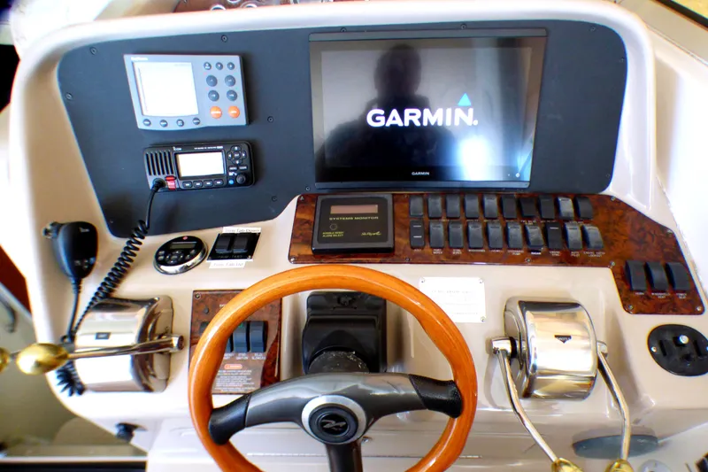 Slide: The Image of Control panel of a 2002 Sea Ray 340 Amberjack with Garmin navigation system. - 15