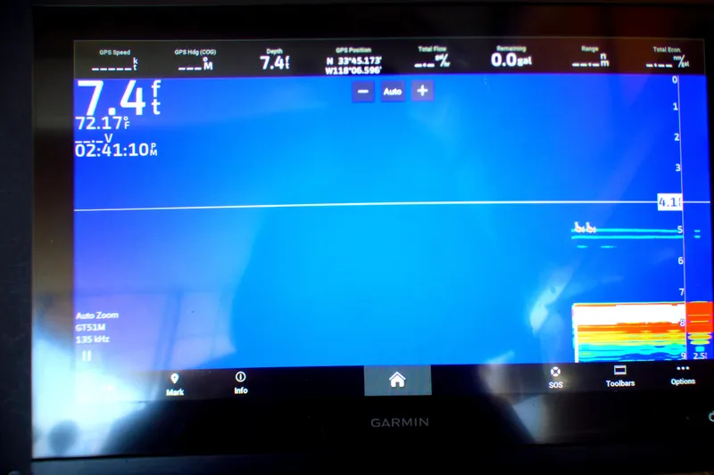 Slide: The Image of Garmin marine display showing depth and temperature on a 2002 Sea Ray 340 Amberjack. - 16