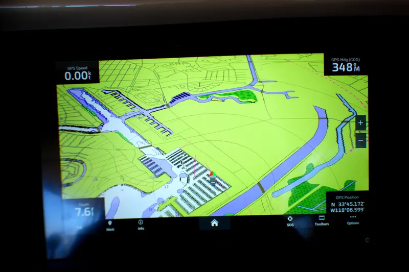 Slide: The Image of GPS navigation screen on a 2002 Sea Ray 340 Amberjack boat, showing marina map. - 17