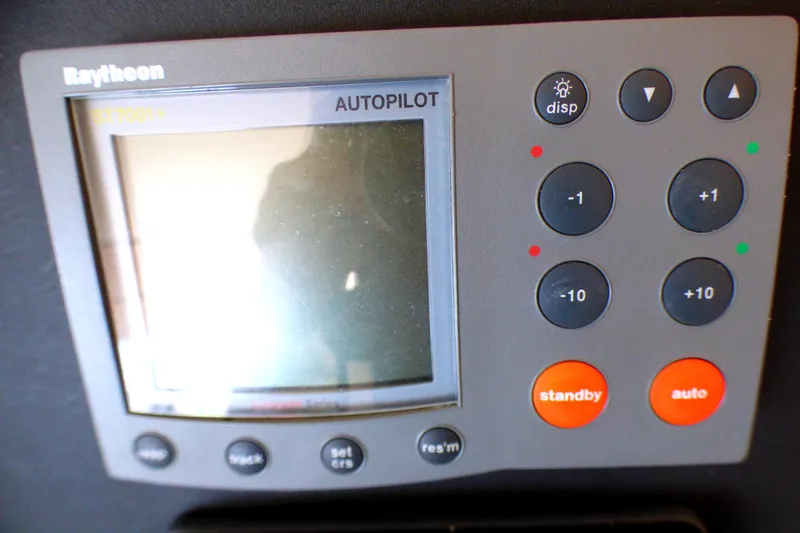 Slide: The Image of Raytheon autopilot control panel on 2002 Sea Ray 340 Amberjack boat. - 20