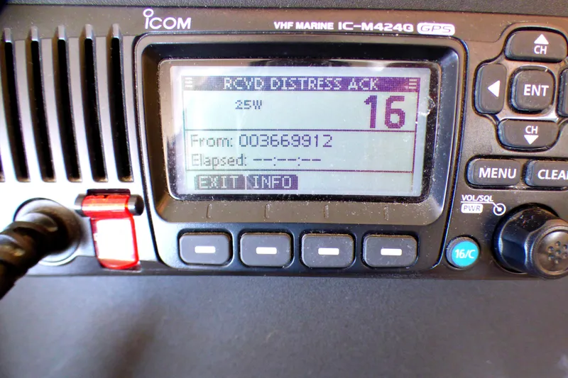 Slide: The Image of VHF marine radio displaying distress acknowledgment on Sea Ray 340 Amberjack, 2002 model. - 21