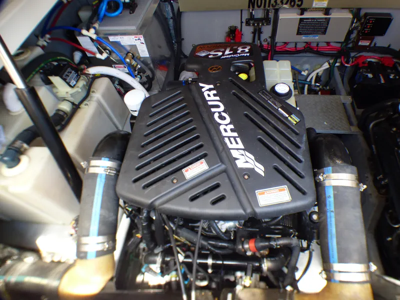 Slide: The Image of Engine compartment of a 2002 Sea Ray 340 Amberjack boat. - 28
