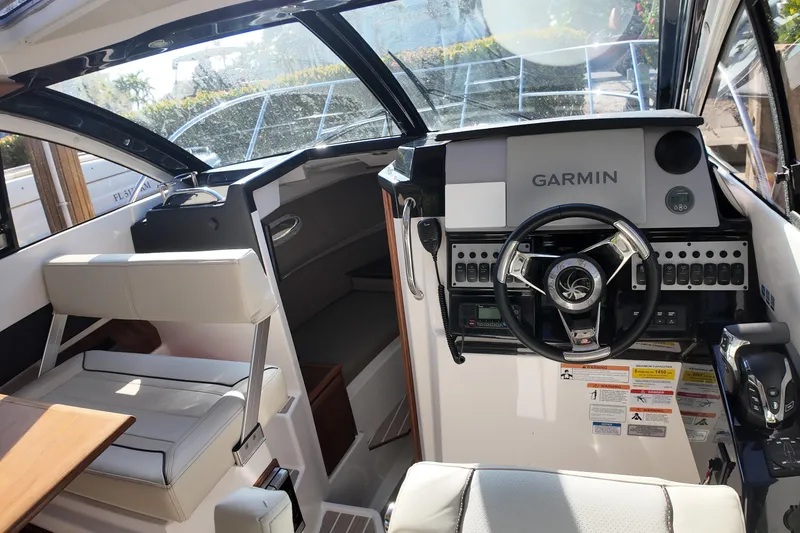Slide: The Image of Interior of 2026 Solara S-250 Coupe boat with Garmin navigation system. - 10