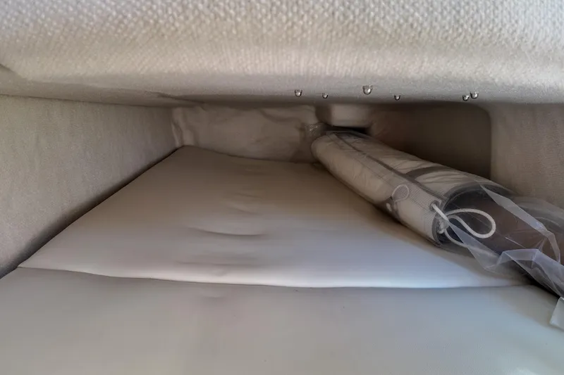 Slide: The Image of 2026 Solara S-250 Coupe interior storage compartment with rolled-up accessory. - 17