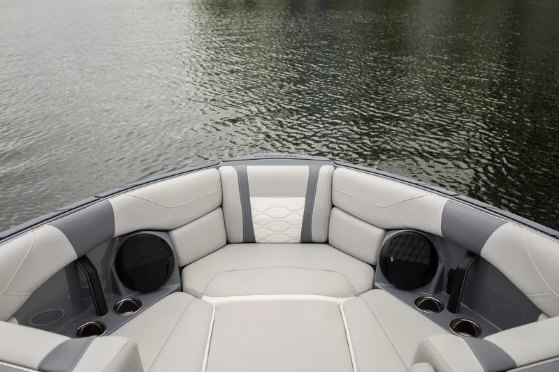 Slide: The Image of 2026 Malibu Wakesetter 23 LSV boat interior with luxurious seating and cup holders. - 13