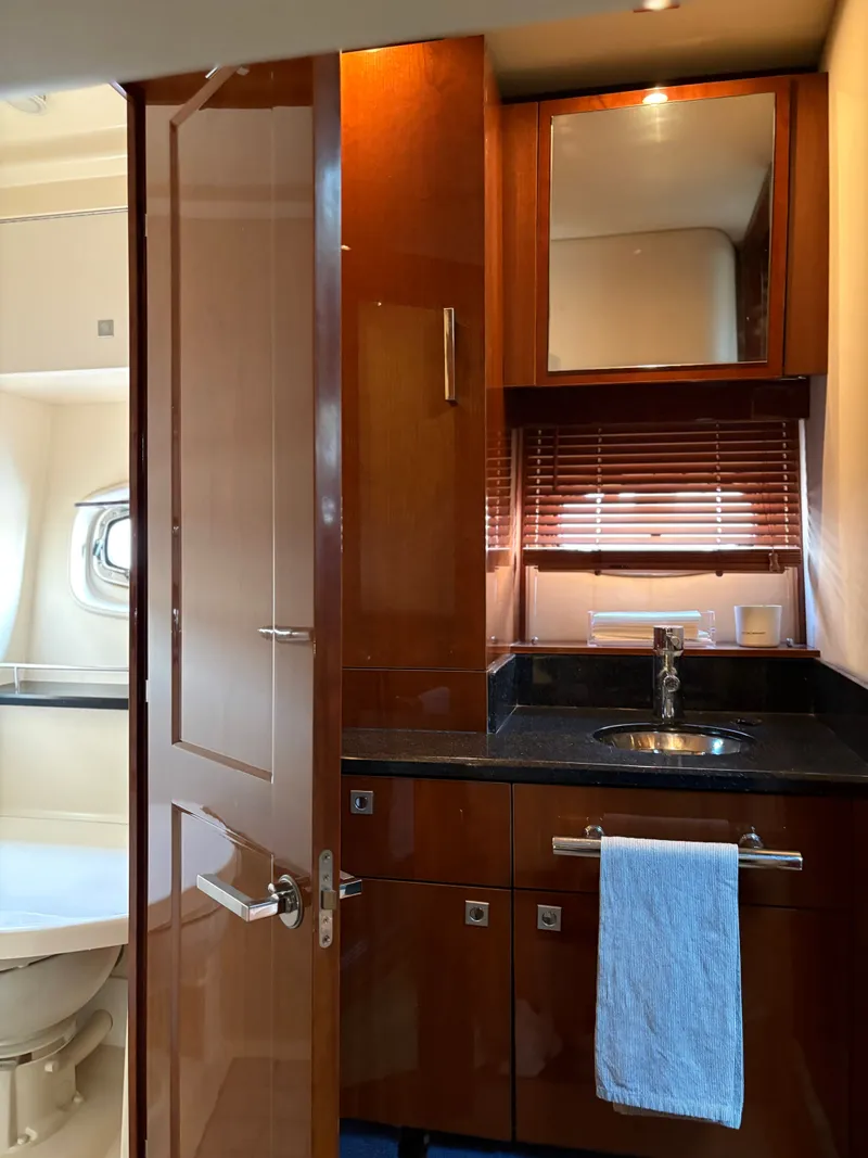 Slide: The Image of Luxurious bathroom on a 2010 Sea Ray 470 Sundancer yacht. - 15