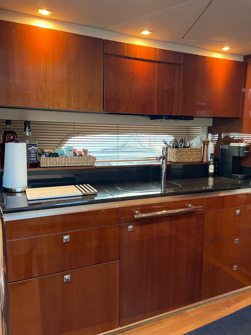 Slide: The Image of Interior of a 2010 Sea Ray 470 Sundancer yacht with cushions. - 7