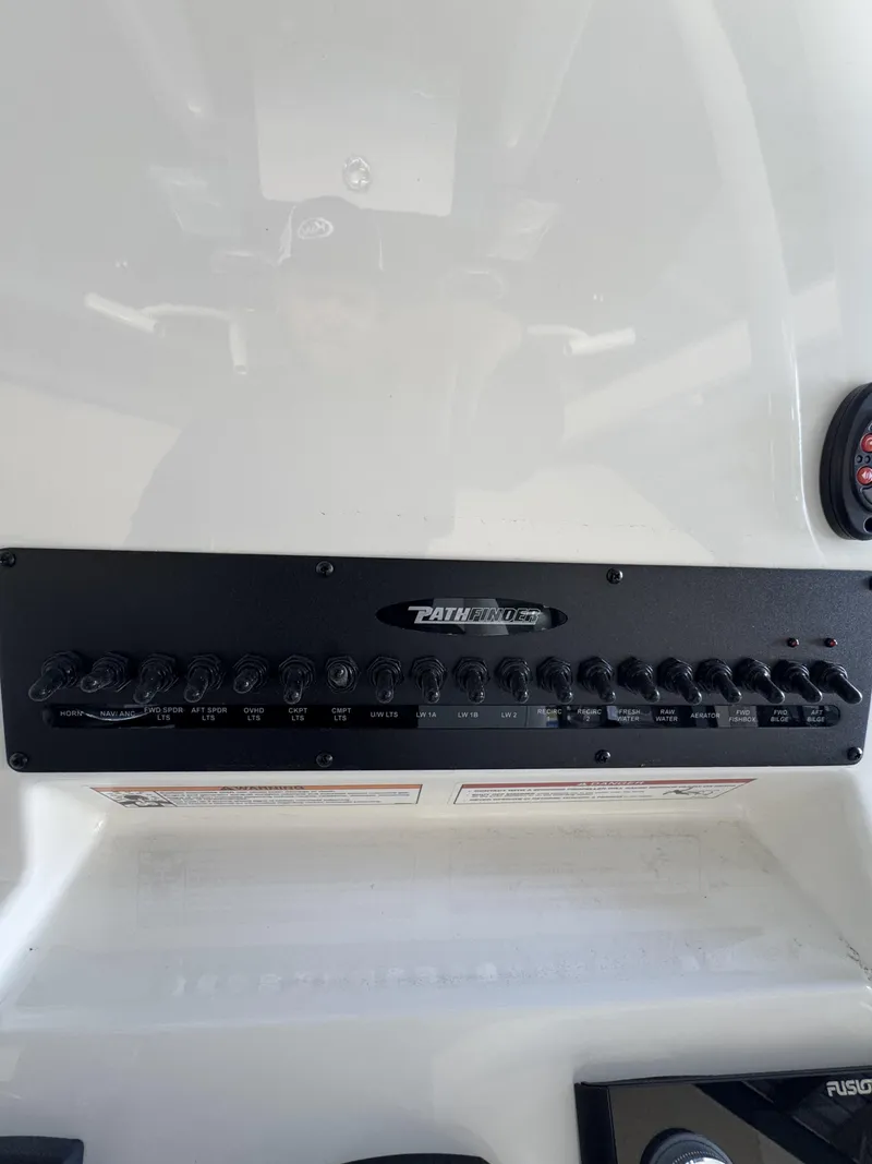 Slide: The Image of Control panel of Pathfinder 2400 TRS boat, year 2026. - 24