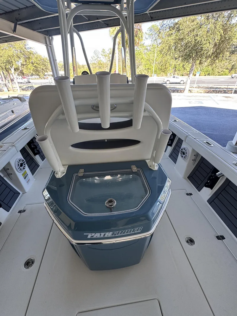 Slide: The Image of Pathfinder 2400 TRS 2026 boat with rod holders and storage. - 39