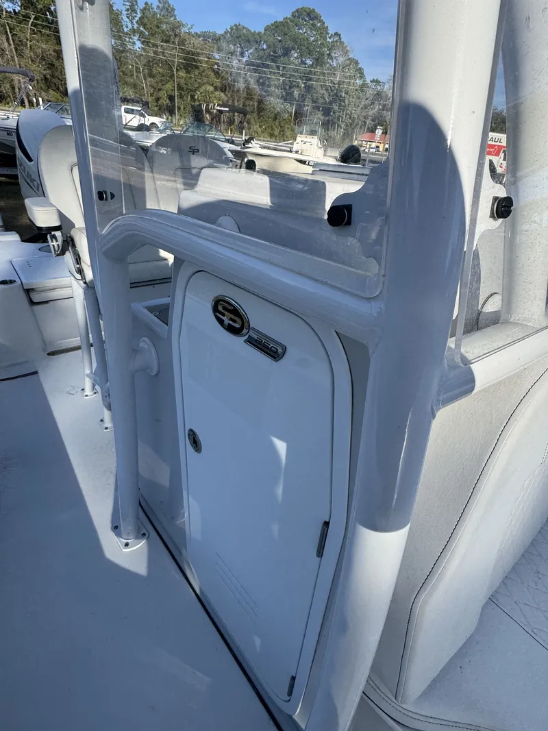 Slide: The Image of 2025 Sea Pro Bay 250 boat cabin with clear view. - 14