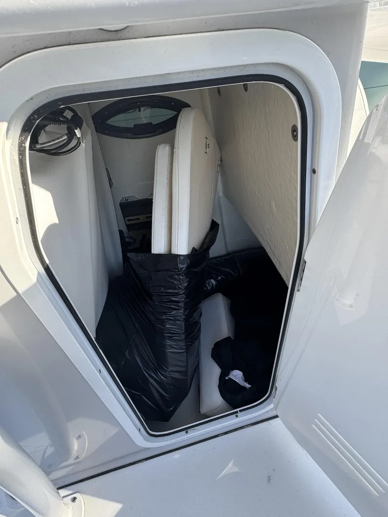 Slide: The Image of Interior of Sea Pro Bay 250 boat cabin, year 2025. - 15