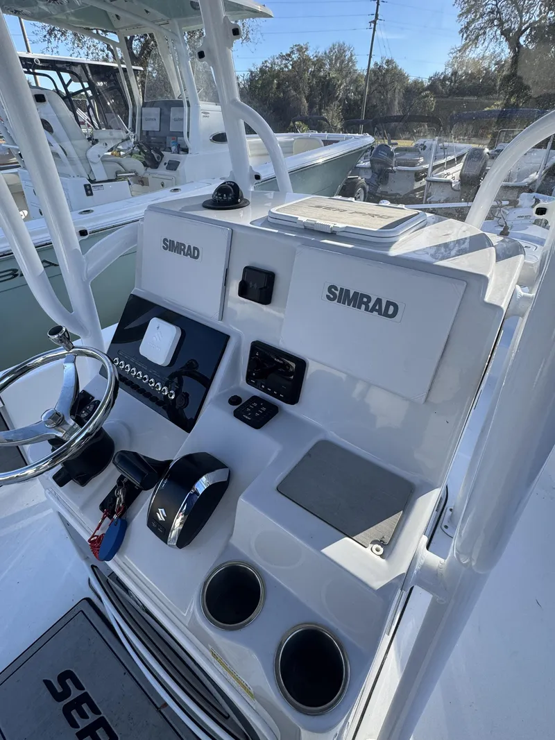 Slide: The Image of 2025 Sea Pro Bay 250 boat console with Simrad equipment. - 18
