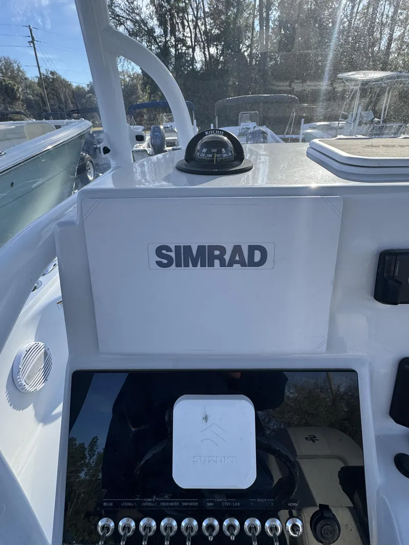 Slide: The Image of 2025 Sea Pro Bay 250 boat with Simrad navigation system. - 19