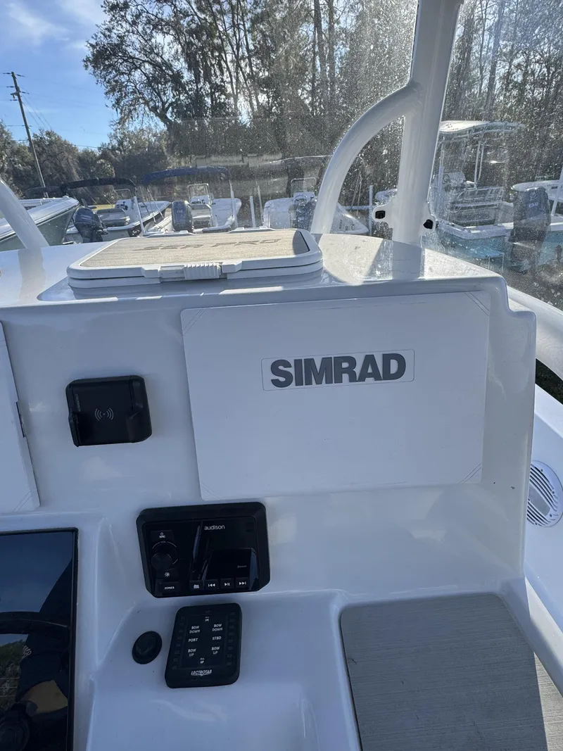 Slide: The Image of Dashboard of a Sea Pro Bay 250 boat with Simrad system. - 20