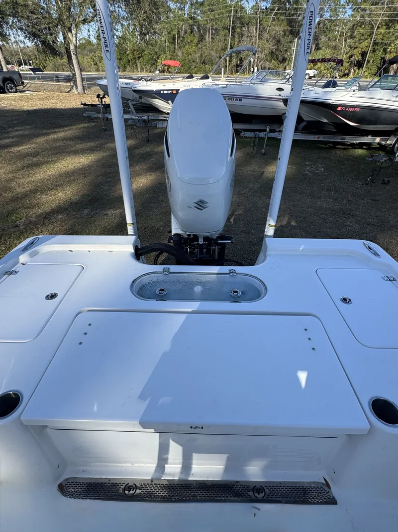 Slide: The Image of Rear view of a 2025 Sea Pro Bay 250 boat with outboard motor. - 25