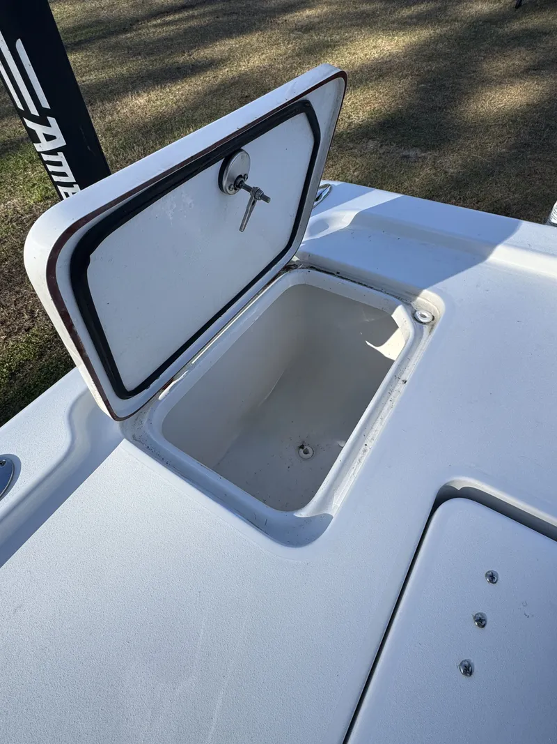 Slide: The Image of Open storage compartment on a 2025 Sea Pro Bay 250 boat. - 29