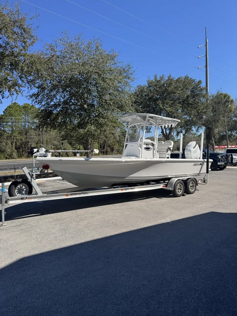 Slide: The Image of 2025 Sea Pro Bay 250 boat on trailer outdoors. - 3