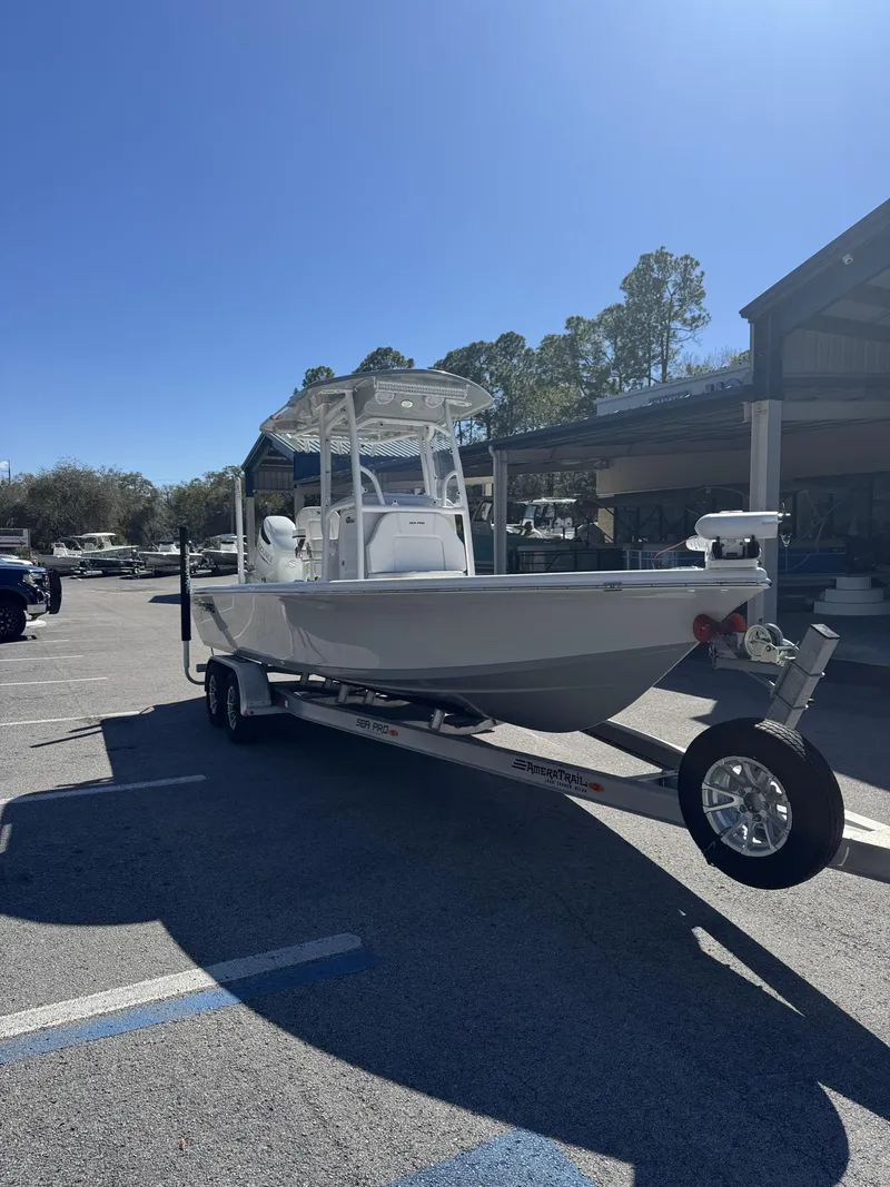 Slide: The Image of 2025 Sea Pro Bay 250 boat on trailer outdoors. - 32