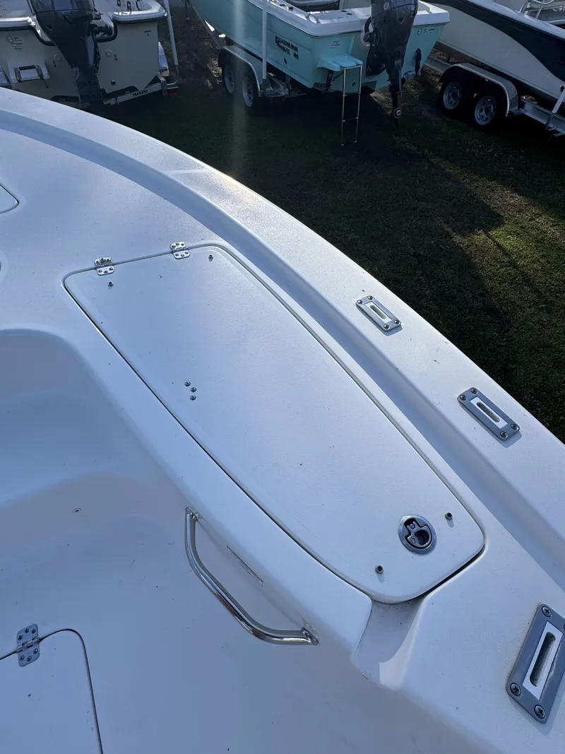 Slide: The Image of 2025 Sea Pro Bay 250 boat deck with storage compartment. - 37