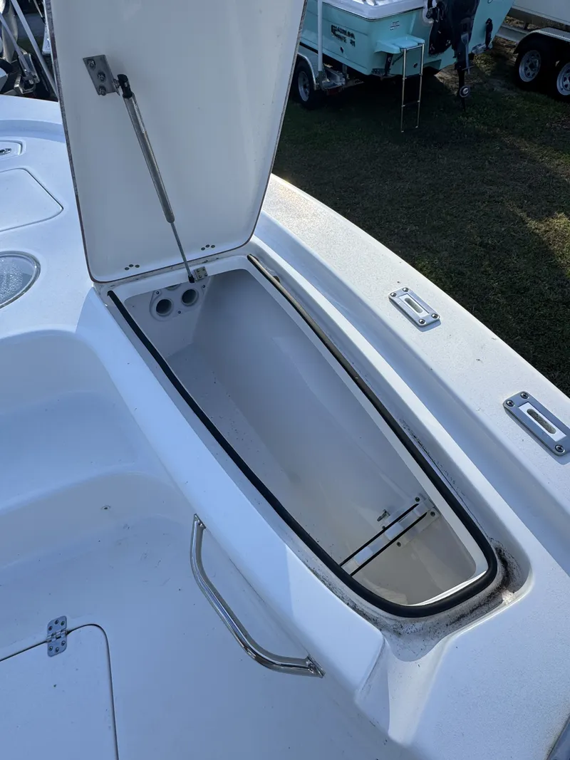 Slide: The Image of Open storage compartment on a 2025 Sea Pro Bay 250 boat. - 38