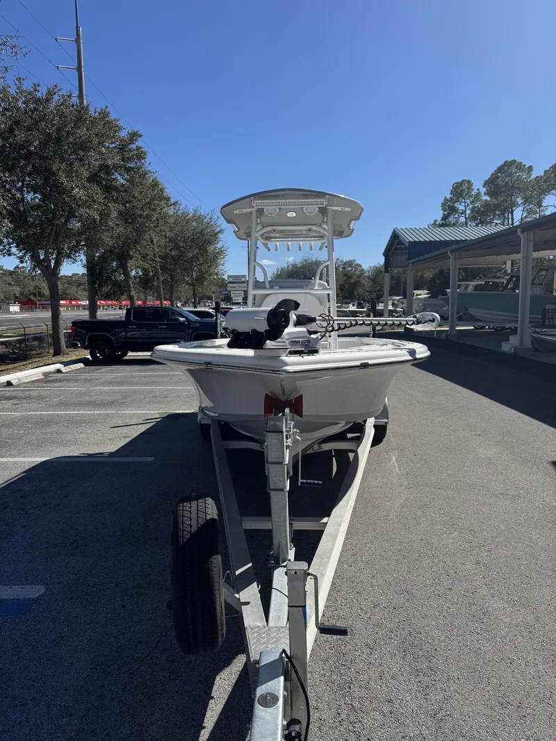 Slide: The Image of 2025 Sea Pro Bay 250 boat on trailer outdoors. - 4