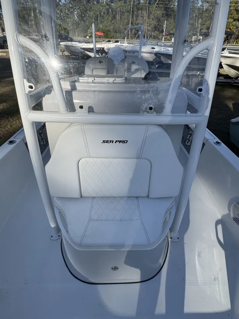Slide: The Image of 2025 Sea Pro Bay 250 boat with white seating area. - 41