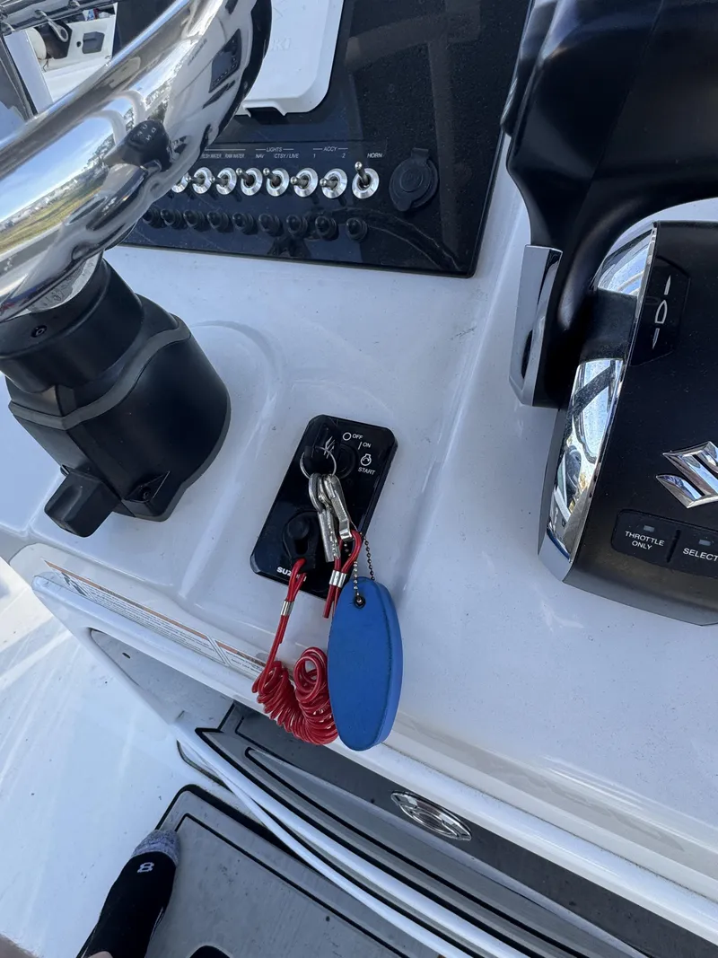 Slide: The Image of Control console of a 2025 Sea Pro Bay 250 boat. - 43