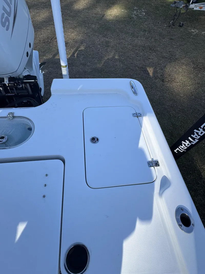 Slide: The Image of 2025 Sea Pro Bay 250 boat deck with storage hatch. - 46