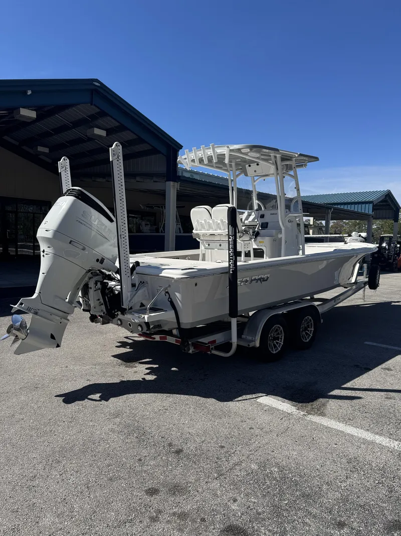 Slide: The Image of 2025 Sea Pro Bay 250 boat on trailer outdoors. - 5