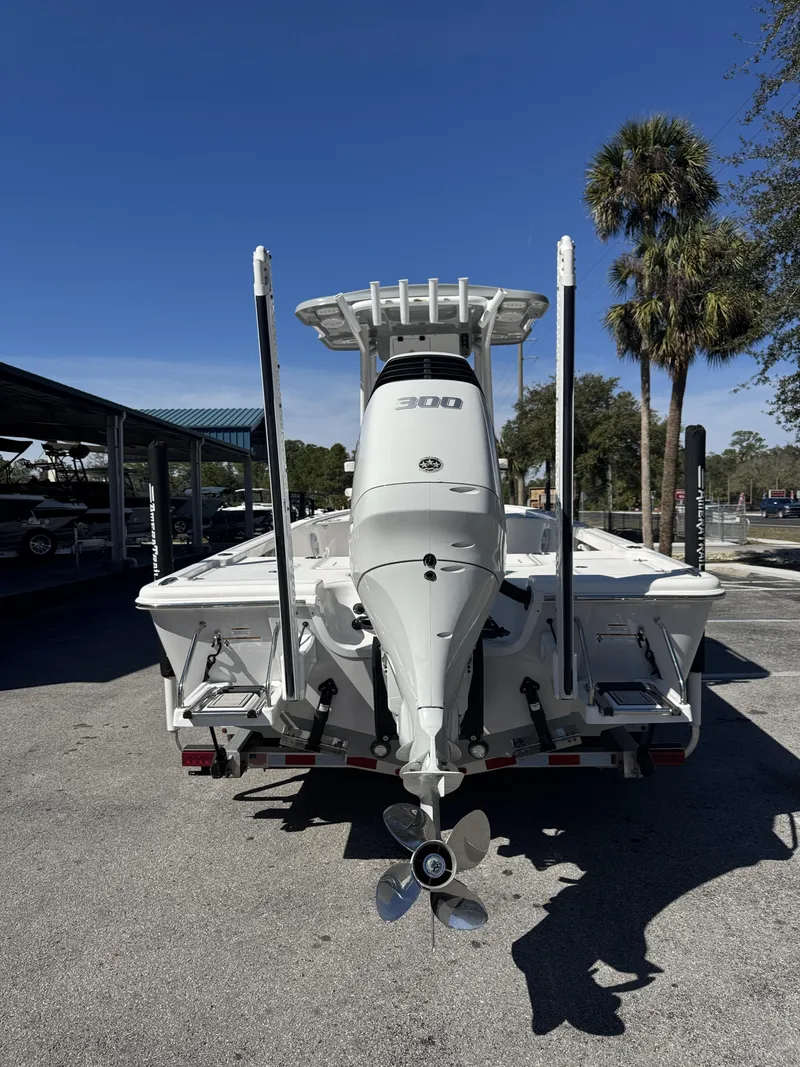 Slide: The Image of Rear view of a 2025 Sea Pro Bay 250 boat outdoors. - 6