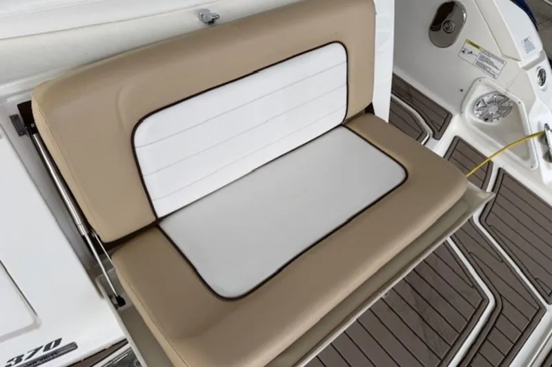 Slide: The Image of 2011 Sea Ray Sundancer 370 boat seat with beige and white upholstery. - 16