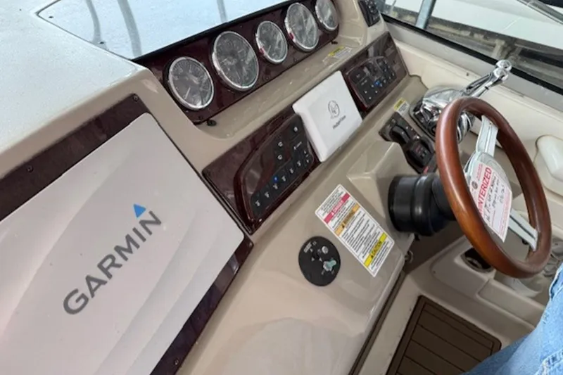 Slide: The Image of Control panel of a 2011 Sea Ray Sundancer 370 with Garmin navigation system. - 5