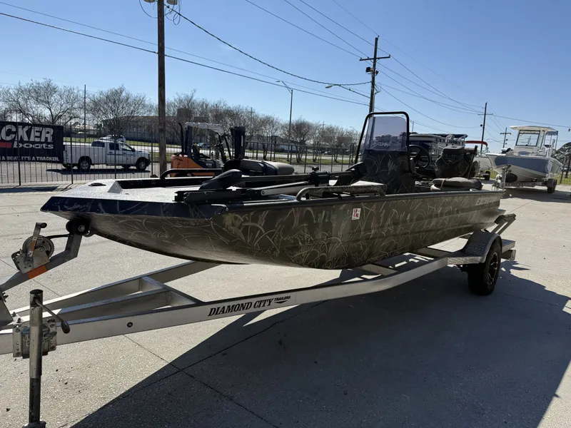 Slide: The Image of 2018 Excel F86 boat parked on trailer outdoors. - 7