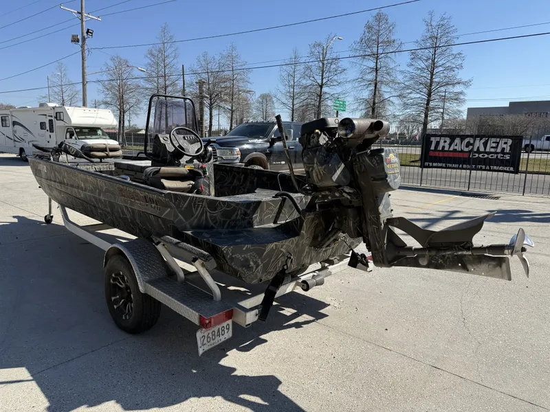 Slide: The Image of 2018 Excel F86 boat on trailer, parked outdoors. - 8