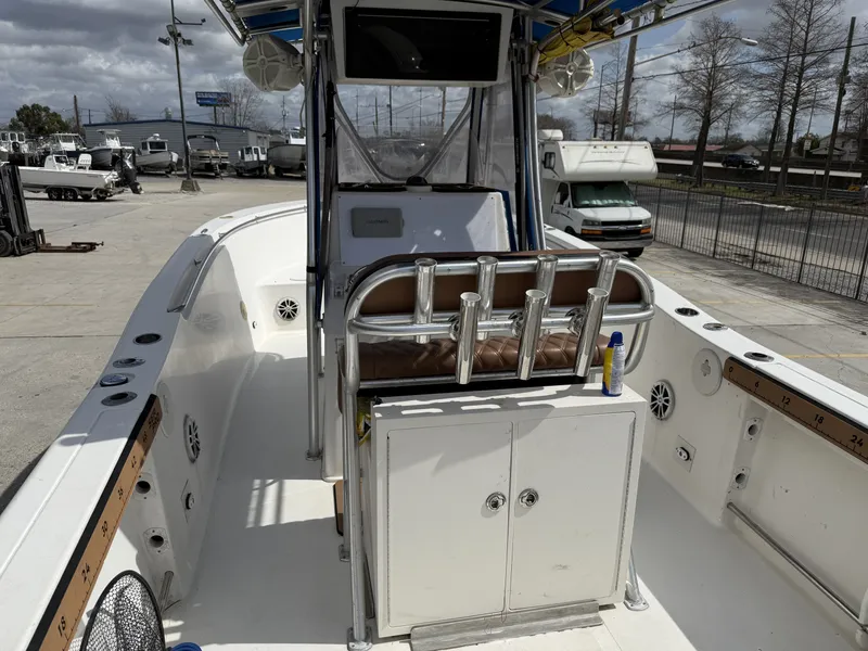 Slide: The Image of Interior view of a 2007 Sea Pro 270 CC boat outdoors. - 4