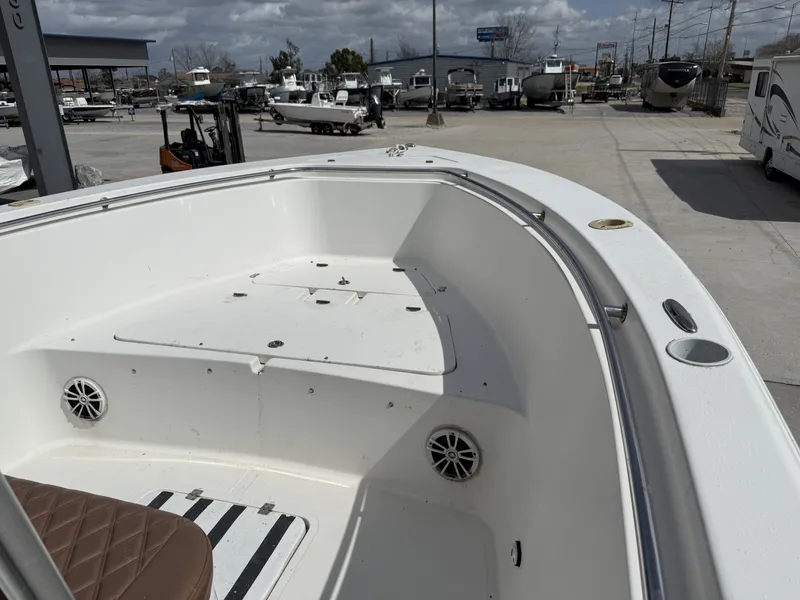 Slide: The Image of Interior view of a 2007 Sea Pro 270 CC boat outdoors. - 5