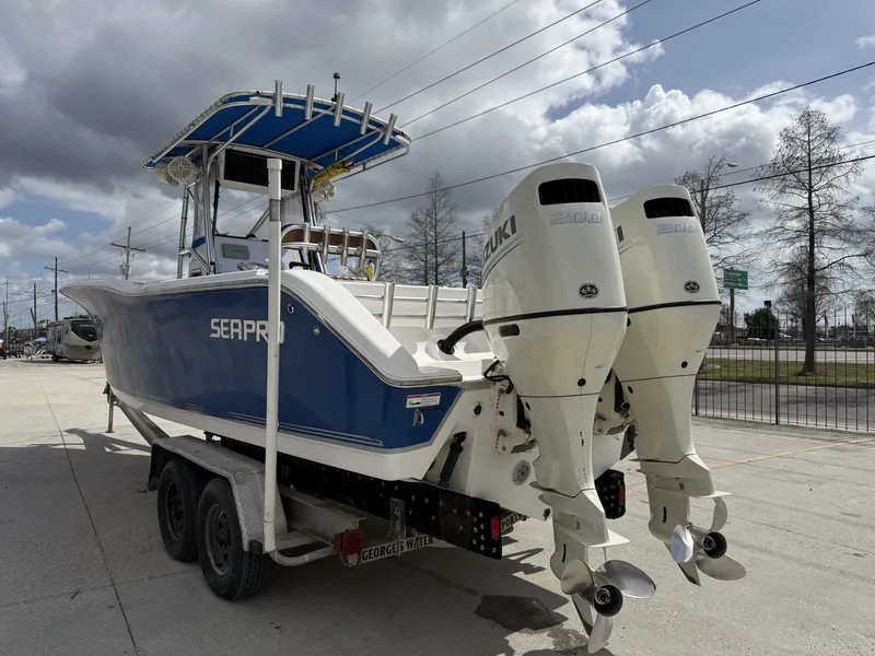 Slide: The Image of 2007 Sea Pro 270 CC boat with Suzuki engines on trailer. - 9