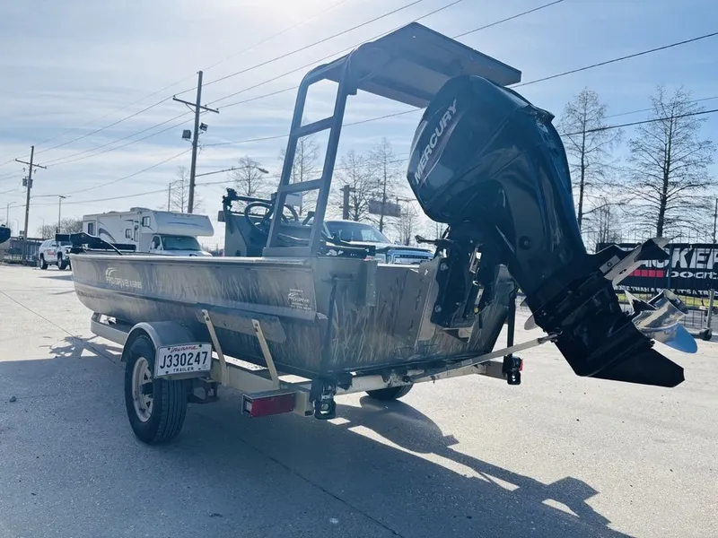 Slide: The Image of 2010 Prodrive 1864 boat with Mercury engine on trailer. - 7