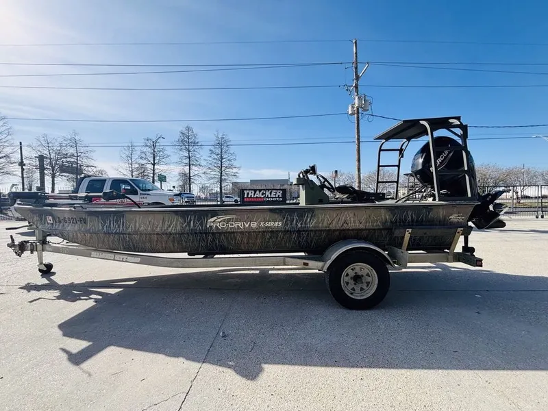 Slide: The Image of 2010 Prodrive 1864 boat on trailer, side view. - 8