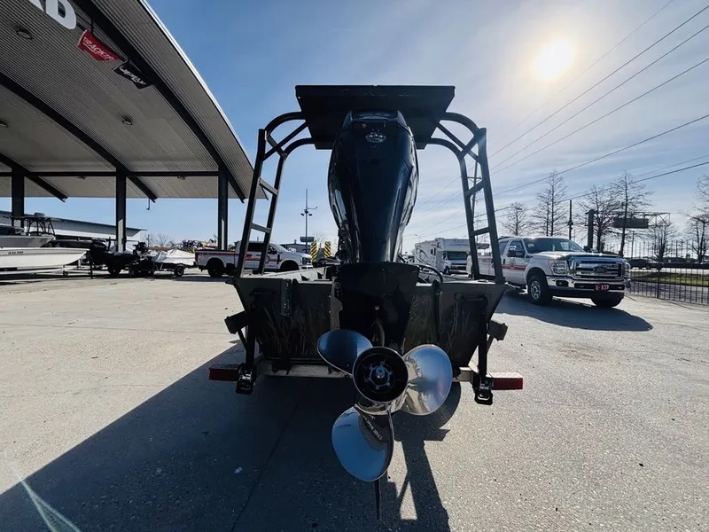 Slide: The Image of 2010 Prodrive 1864 boat with outboard motor in parking lot. - 9