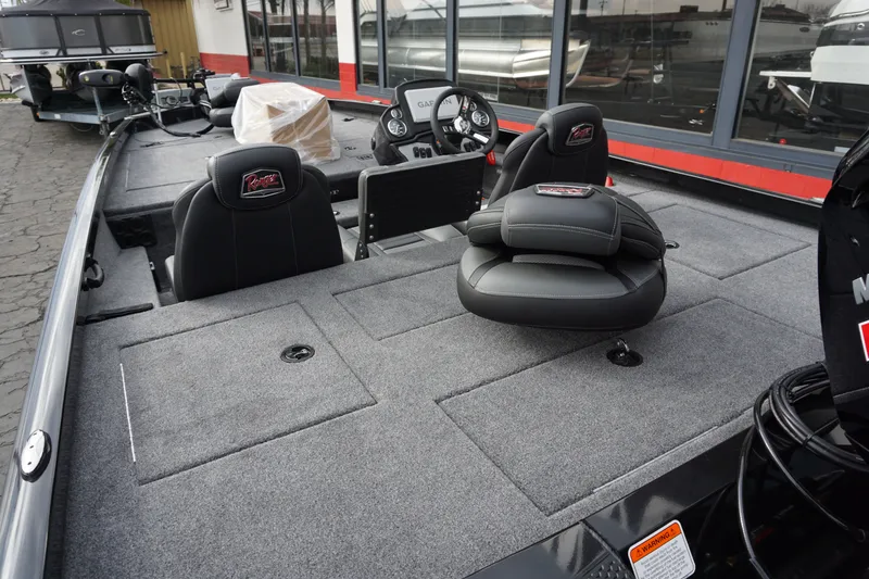 Slide: The Image of Interior of 2026 Ranger RT188P with gray carpet and black seats. - 5