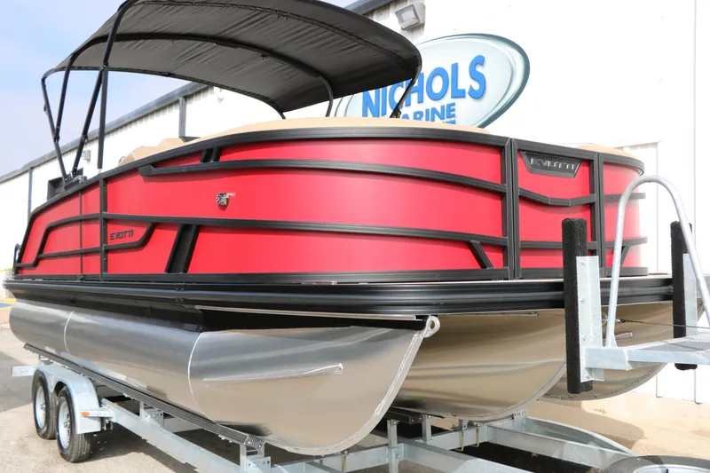 Slide: The Image of 2026 Evotti 521CS pontoon boat with red exterior on trailer at Nichols Marine. - 3