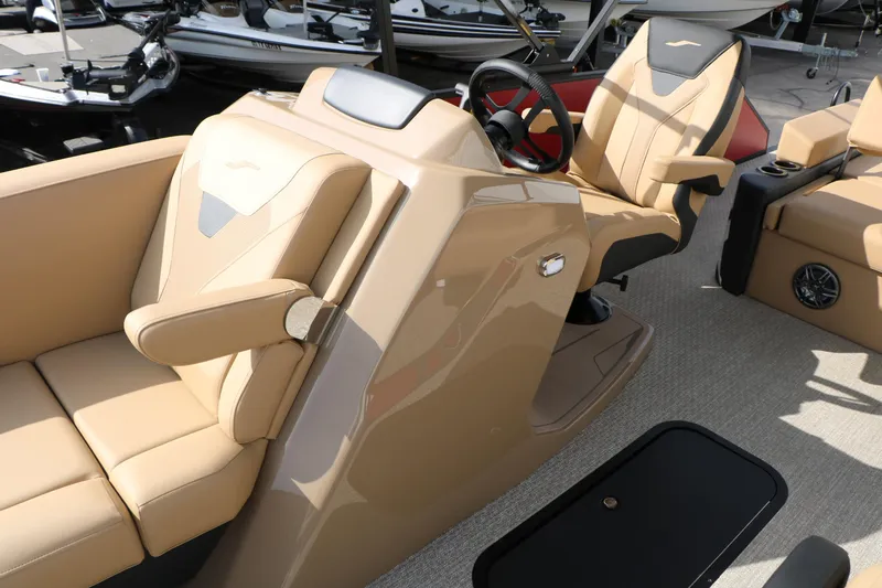 Slide: The Image of Luxurious interior of 2026 Evotti 521CS boat with tan leather seating and modern steering console. - 42