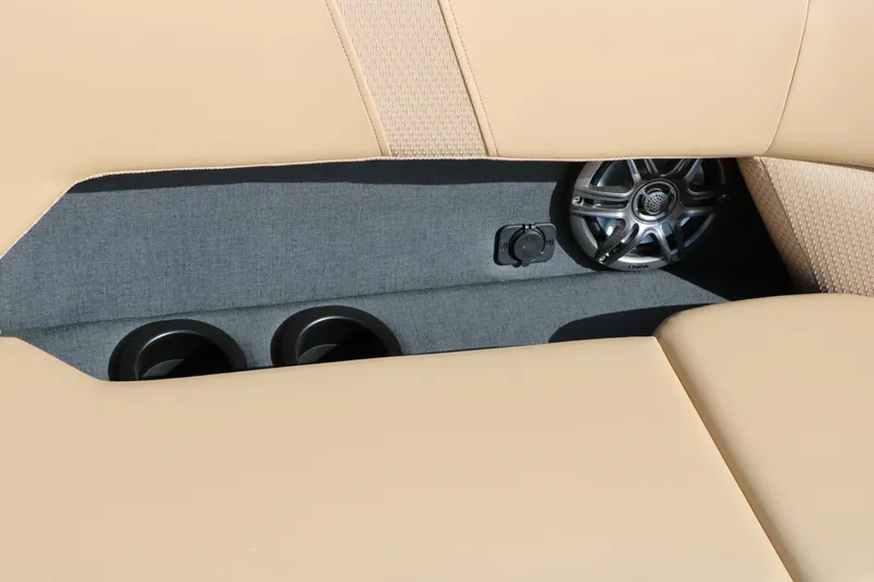 Slide: The Image of 2026 Evotti 521CS interior with beige seats, cup holders, and speaker system. - 45