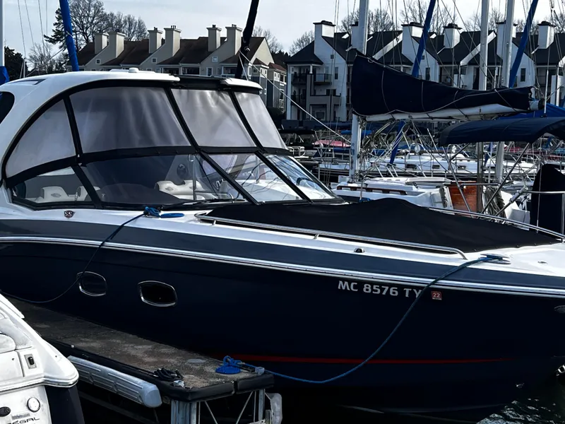 Slide: The Image of 2017 Chaparral 337 SSX boat docked at marina. - 0