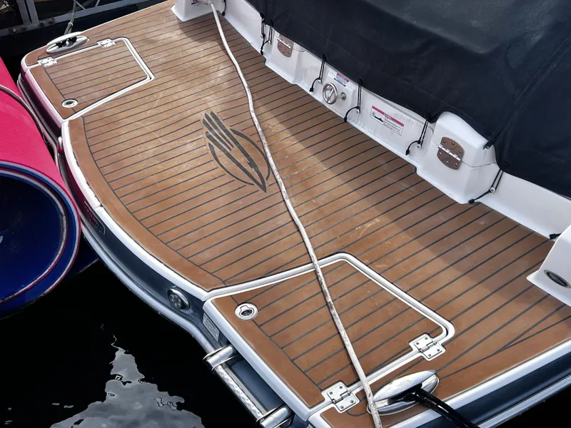 Slide: The Image of Stern platform of a 2017 Chaparral 337 SSX boat at dock. - 1